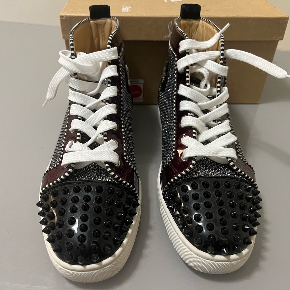 Authentic men’s Christian louboutin high top sneakers. Size/7.